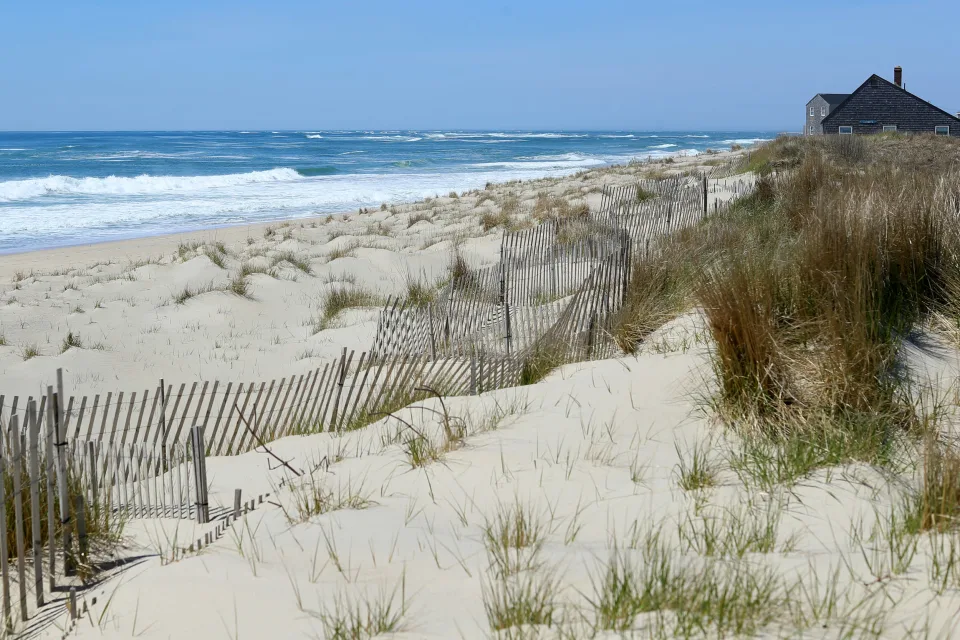 Nantucket deeply divided over allowing women to be photographed naked on the beach